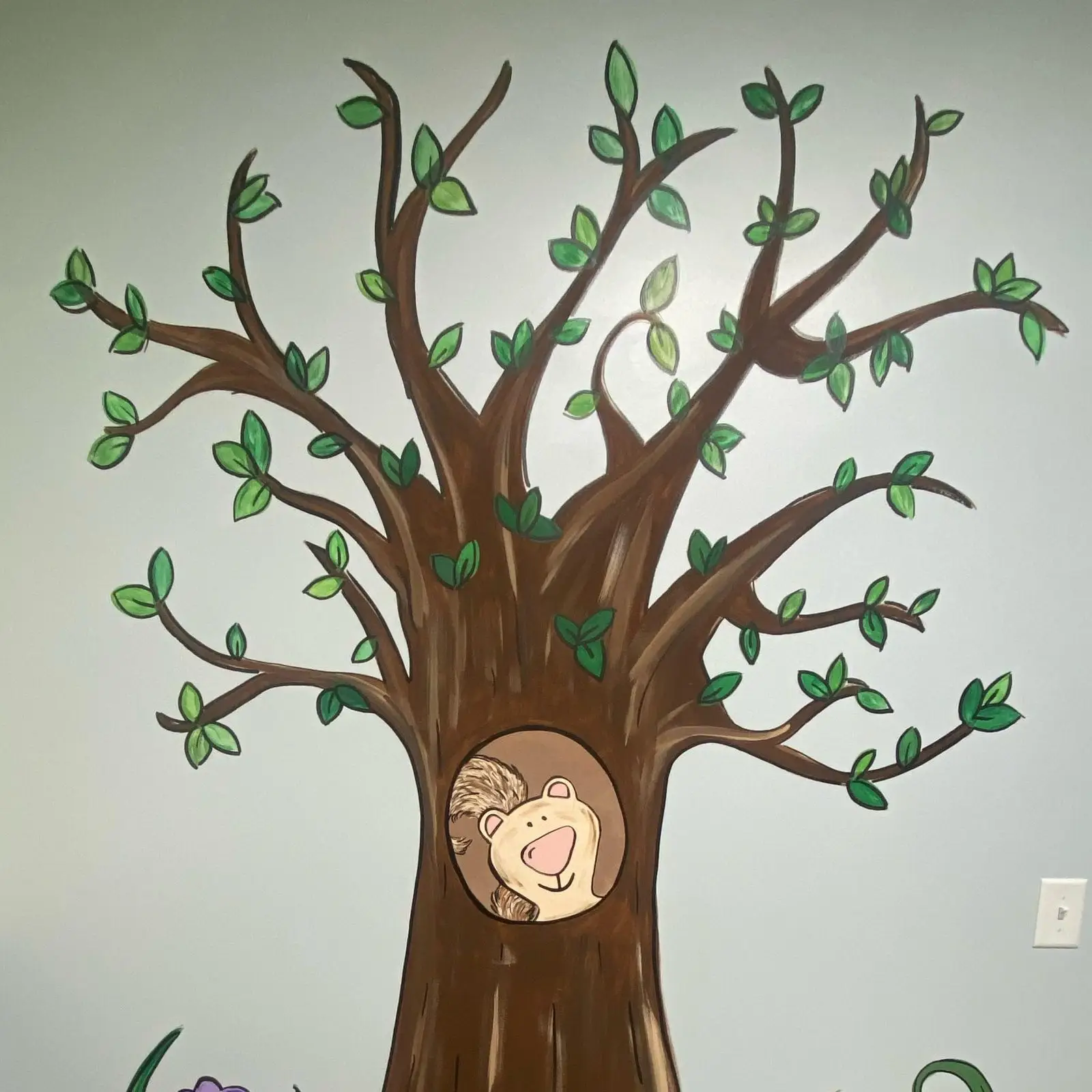 Pebbles Nursery Room with Tree Mural